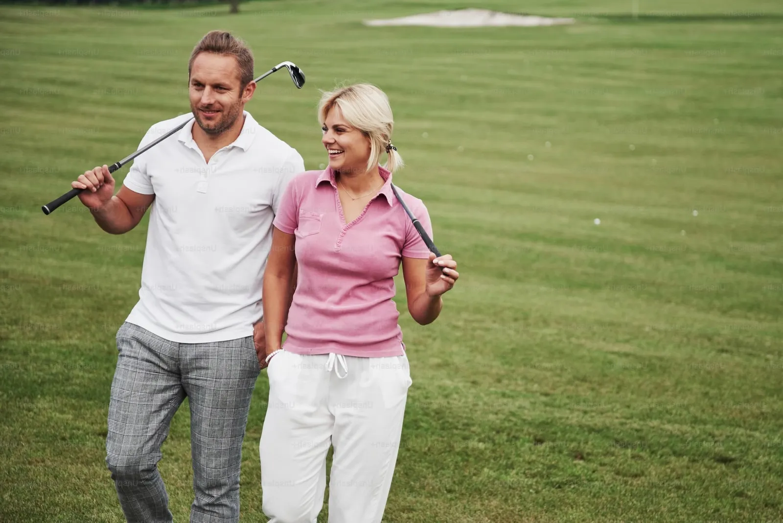 Golfers of different ages training together in supportive environment